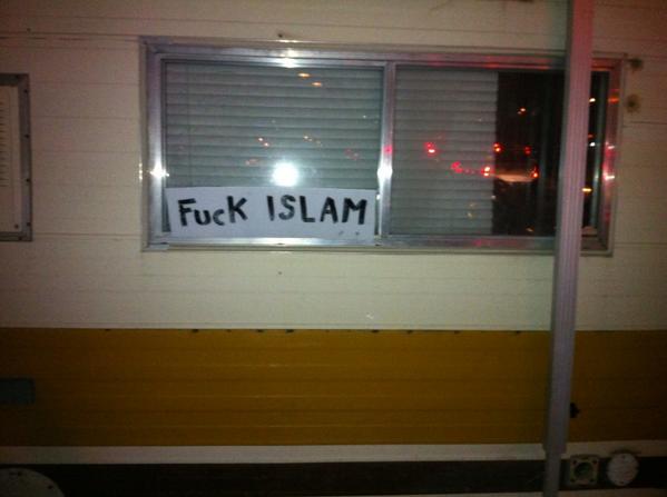 A sign seen on a "tailgate" camper, outside McMahon, after last nights game.  What?