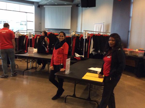 MonisaCheung's tweet photo. Convocation staff and student ambassadors helping the grads with the gowns. #senecagrad2014 http://t.co/RpNRuAkb7F