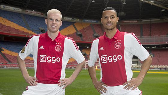 AFCAjax's tweet photo. Ricardo van Rhijn en @DavyKlaassen met #Ziggo op de borst. Vanaf 1 januari 2015 speelt #Ajax in deze shirts! http://t.co/9qD8AK9lEu