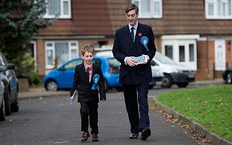 LondonCF's tweet photo. Great picture of Jacob Rees Mogg and his son campaigning for a #Conservative win in #RochesterandStrood yesterday http://t.co/o7jFJ8XSOt