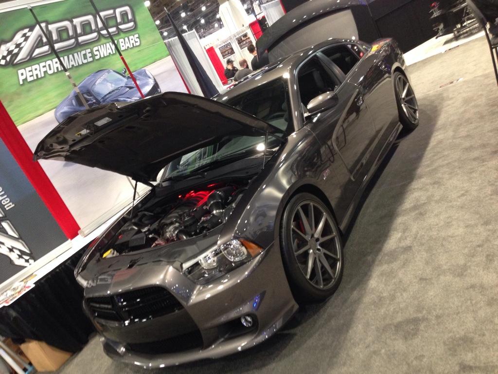 LiveAtSEMA's tweet photo. It's a 2013 @Dodge Charger SRT8 with a 6.4L #Hemi #LivefromSEMA http://t.co/EBauJrb9UA