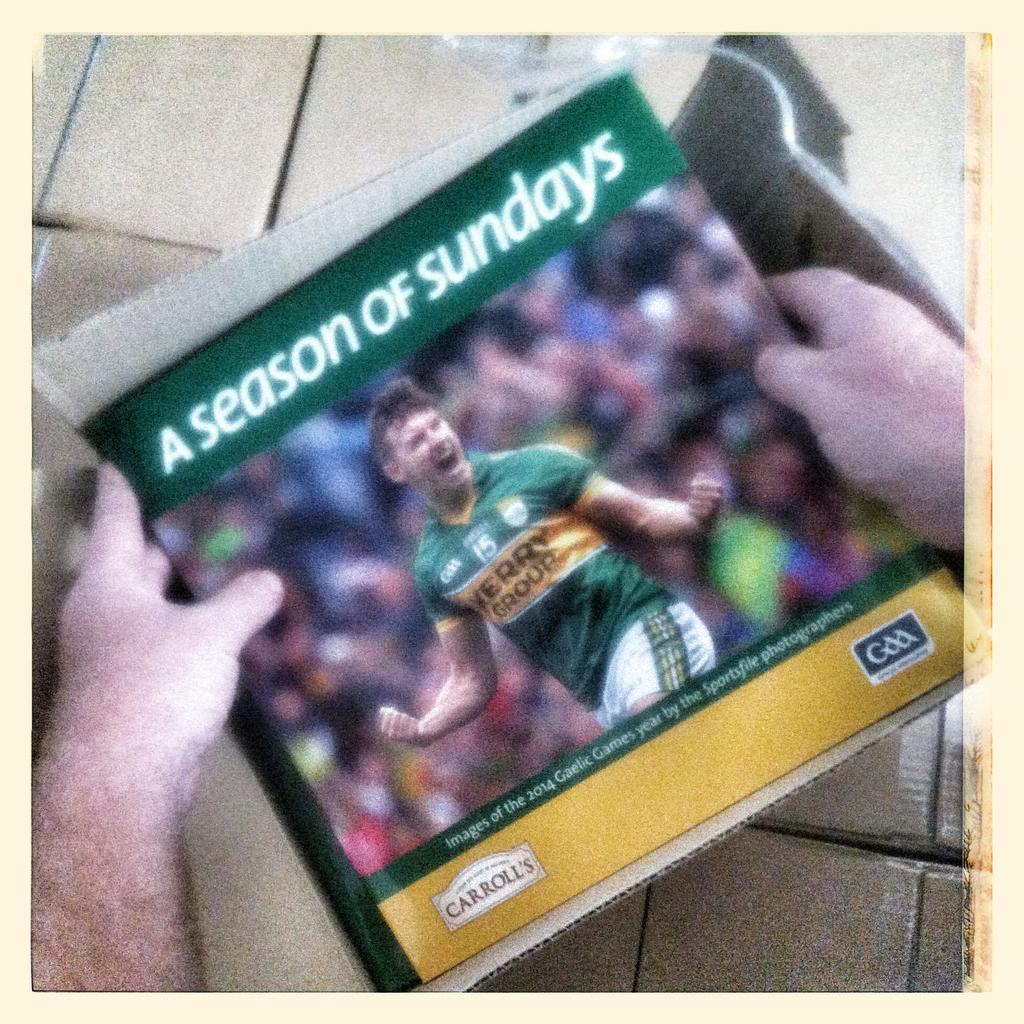 sportsfile's tweet photo. A Season of Sundays 2014 has landed at Sportsfile HQ! Congrats @Jamesod7 for being this year's cover! #SOS2014 http://t.co/sF5coGAzce