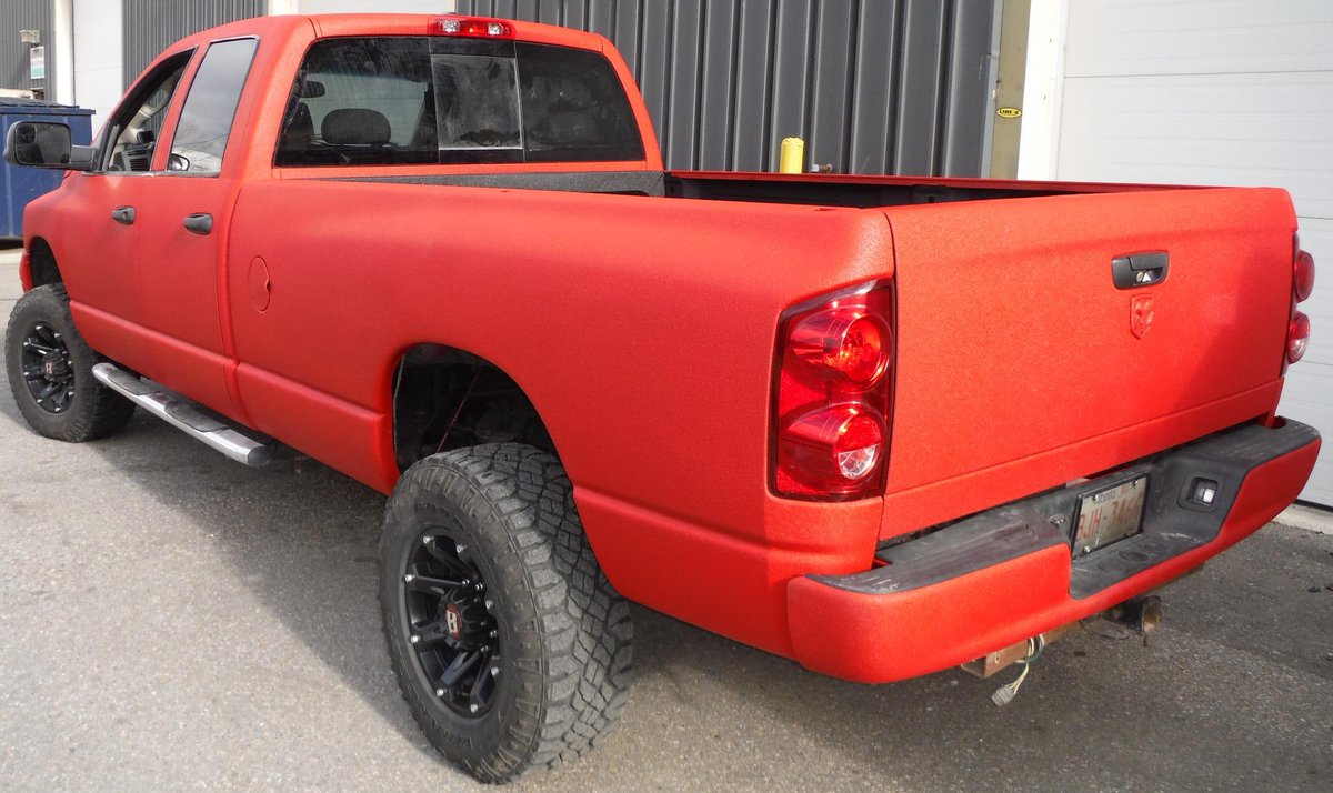 LineXCalgary's tweet photo. #Hail Damaged Red HD #Ram after #LineXProtects http://t.co/Hq20ZktLft