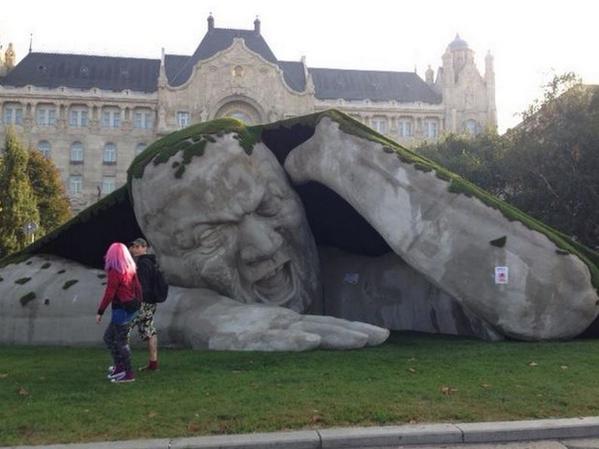 CityLab's tweet photo. Budapest's newest public art is a humongous, yelling man http://t.co/0mNzrJjv2W http://t.co/pNkgLC8qmS