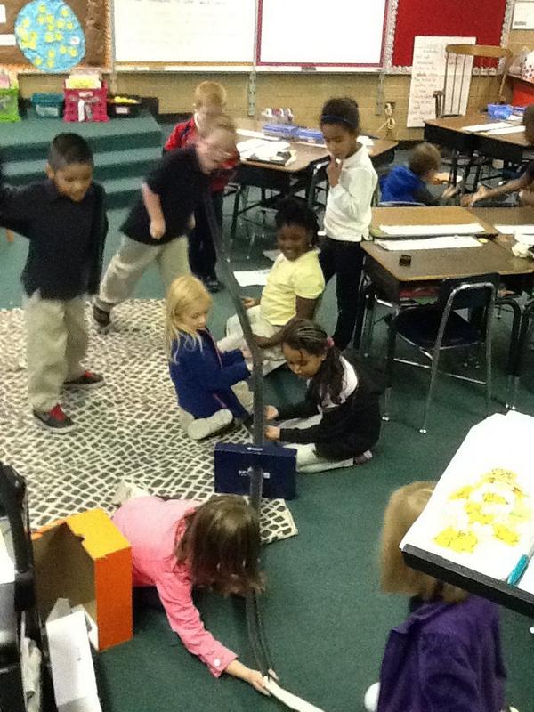 TracyCChristy's tweet photo. Students using what they learned about force and motion to create a roller coaster!  Fun times! http://t.co/IojWMng64G