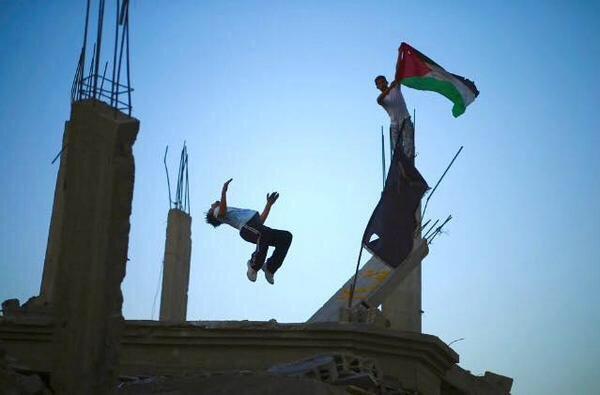 Palestinian youth practice their parkour skills over the rubble of houses in #Gaza. 

#Palestine #GazaResist