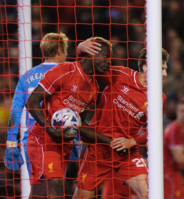 LFC's tweet photo. PHOTO: @FinallyMario is congratulated by Adam Lallana after scoring the equaliser against Swansea in front of the Kop http://t.co/e3hpoKTVhn