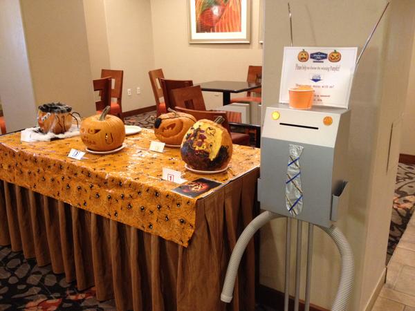 HamptonInnTrop's tweet photo. The Annual Pumpkin carving competition has come out! Come vote for your favorite! #HamptonFACT #31daysofHOH http://t.co/HVtlsljiUg