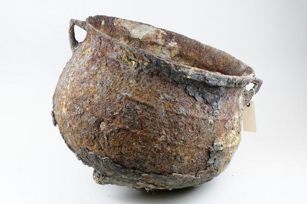 LeedsMuseums's tweet photo. Metal cauldron found bricked up behind a wall in a basement in #Chapeltown in 2012 #DiscoveryCentre #MusSpooks #Leeds http://t.co/56owFFncMF