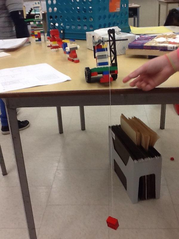Libramlad's tweet image. Pulley made by M.B.  Look who is pulling her weight! #gr4science