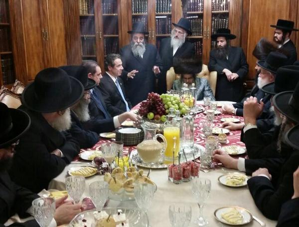 Governor Cuomo Is Visiting Now Satmar At Home For The Satmar Bloc-Vote, R'Moshe Duvid Neiderman Is Speaking. Photo: