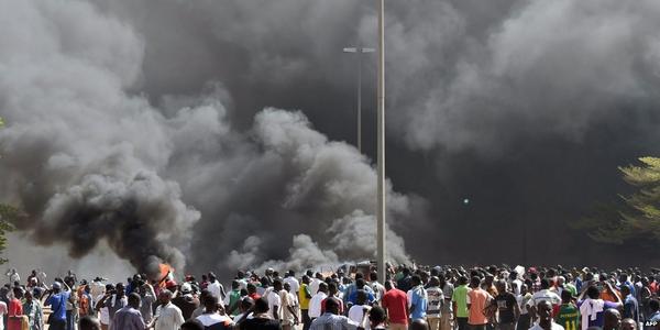 Smoke rising from Burkina Faso's Parliament in Ougadougou after being stormed by protesters bbc.in/1rV9Rme