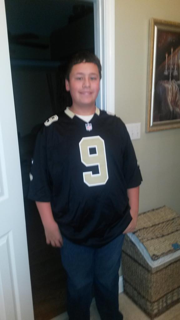 allynld1214's tweet photo. Jordan wearing his new jersey to school for team day on game day #whodat http://t.co/v5uhty024W