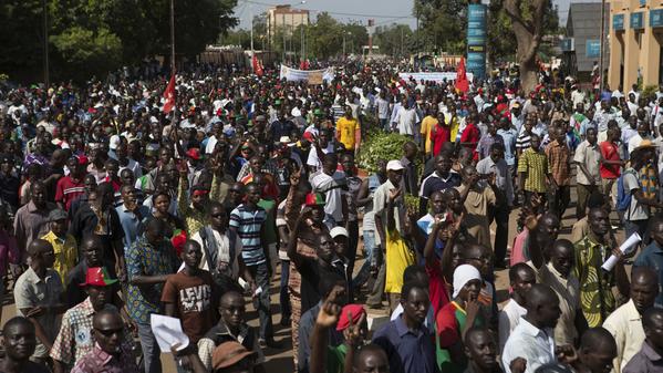 Channel4News's tweet image. Protesters burn parliament and take over TV station in Burkina Faso's 'Black Spring' channel4.com/news/burkina-f… #Lwili