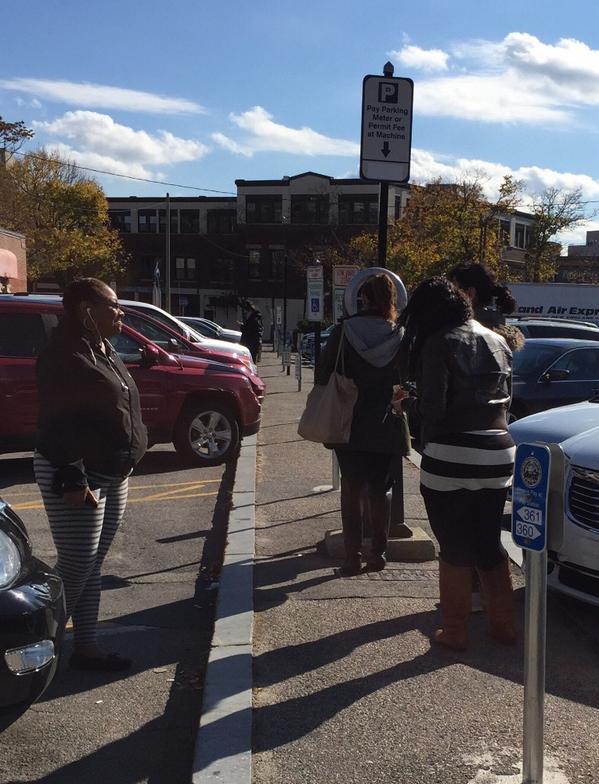 Queuing up for the meters in Coolidge Corner. The meters still stink. Note to self: don't shop here again.