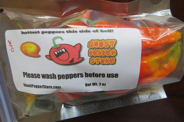 Starting to feel very nervous now, look what arrived today! Worrying tagline 'hottest peppers this side of hell!'