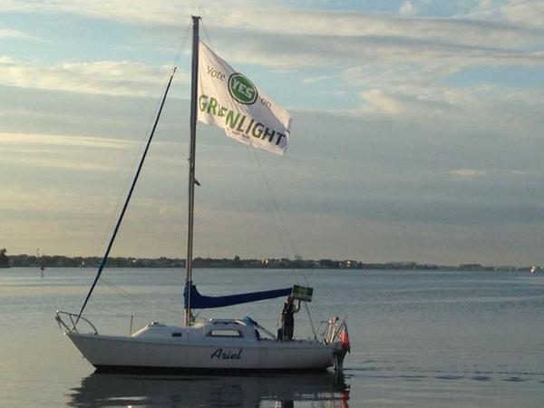 10TampaBay's tweet photo. Greenlight supporters' flag flies over Bay: http://t.co/NpnnG5QfK1 http://t.co/nROVVRQl3U