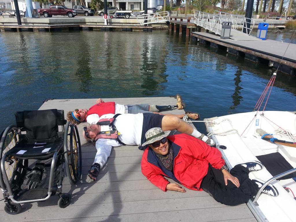 Young, Childers, and Wallace taking a break after a long day of sailing #USDisabledSailing