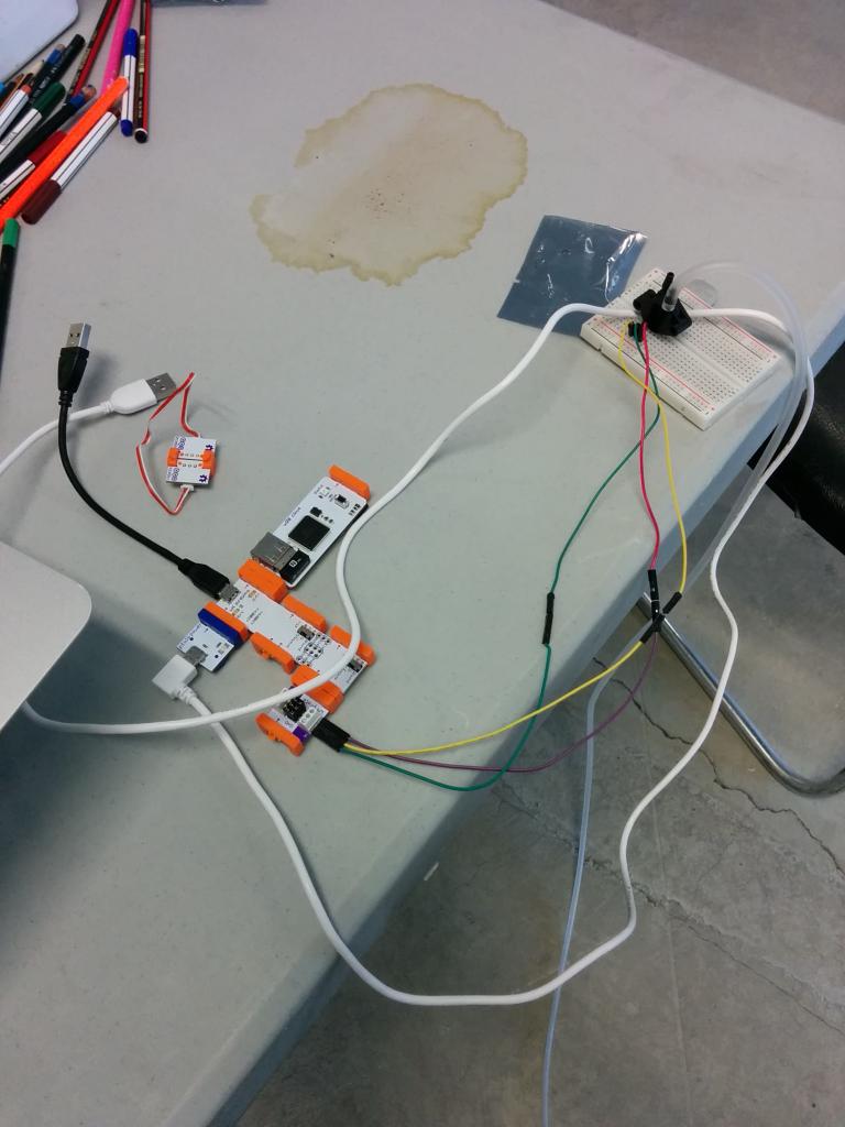 russelg's tweet photo. One of the #HackMiramar bike and walker counter prototypes. Yup that is fish tank air tube for the pressure sensor. http://t.co/e1fLFWyAlW
