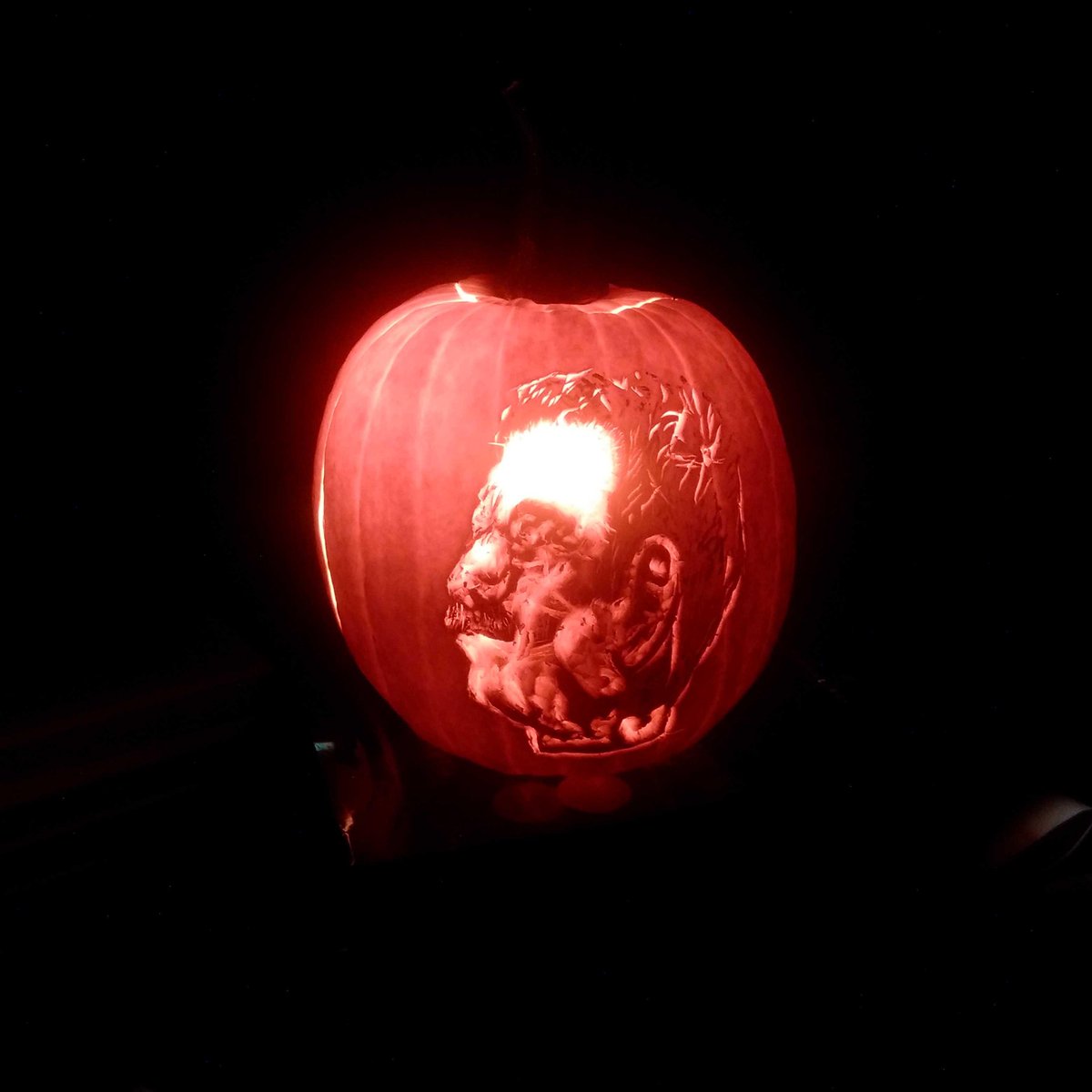Cmdr_Hadfield's tweet photo. Happy Halloween, from a spookily cool Chris O'Lantern. Nice carving, Jesse! http://t.co/NY46PxaCbx