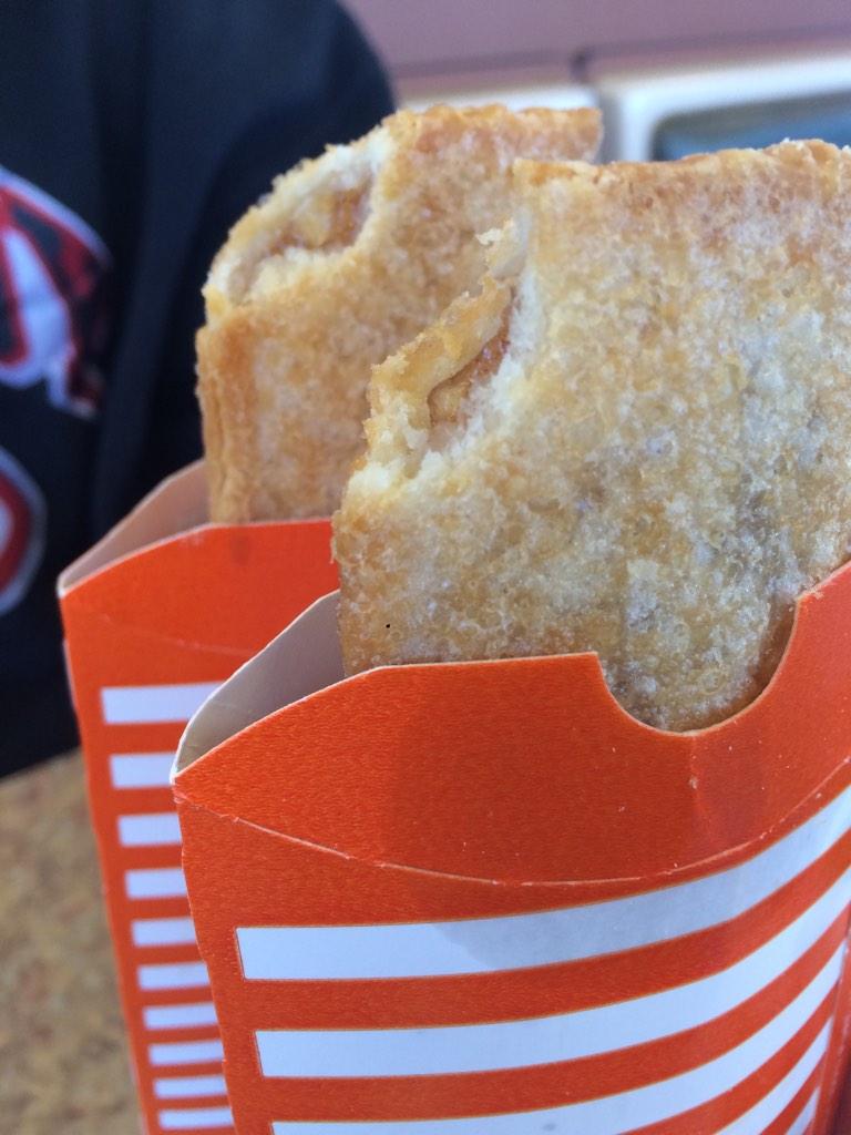 markbenno's tweet image. Sharing #Whataburger apple pies with son #2, but they look like twinkies.