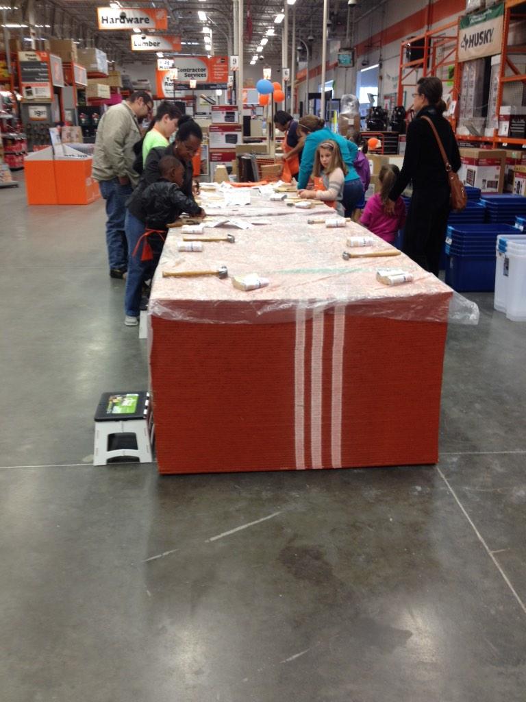 Kids Workshop! Happening now, put on a coat and come on down! We're making pallet coasters.