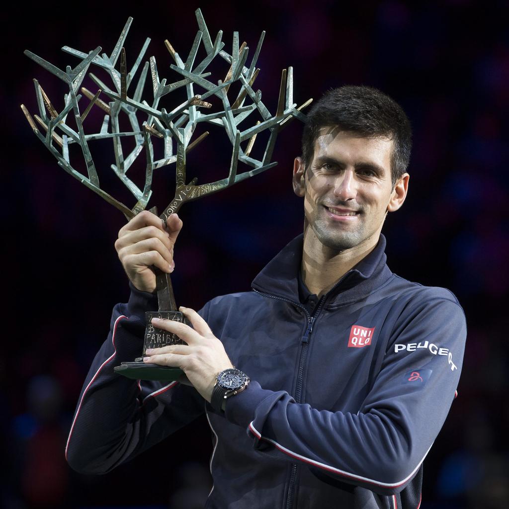 WeAreTennis's tweet photo. Novak #Djokovic, king of the @bnppmasters ! #BNPPM http://t.co/nkoVDz2NTy