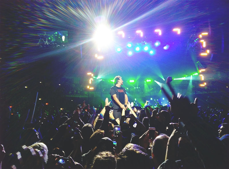 PearlJam's tweet photo. Eddie climbing into the crowd at last week's Milwaukee show. #PJFall2014  #PearlJam http://t.co/CFtgWmt4sC