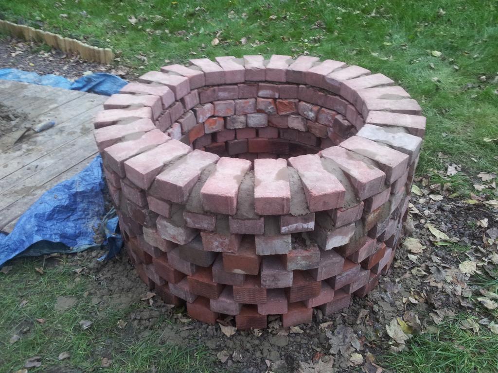 ststephenswell's tweet photo. Good progress was made this weekend on the bbq/fire pit &amp; plastic bottle greenhouse http://t.co/hJzPE2Jk9P