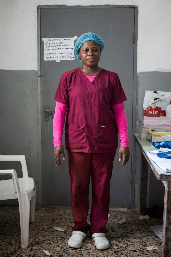 WIRED's tweet image. Powerful photo series shows how Ebola workers get dressed, and puts a face to the bravery wrd.cm/10geHCP