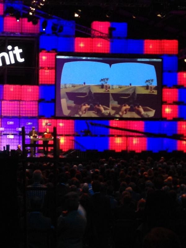 WebSummit's tweet photo. Main Stage Now: Demo showing Oculus Rift being used to successfully treat soldiers for post traumatic stress http://t.co/L1rbk8mGto