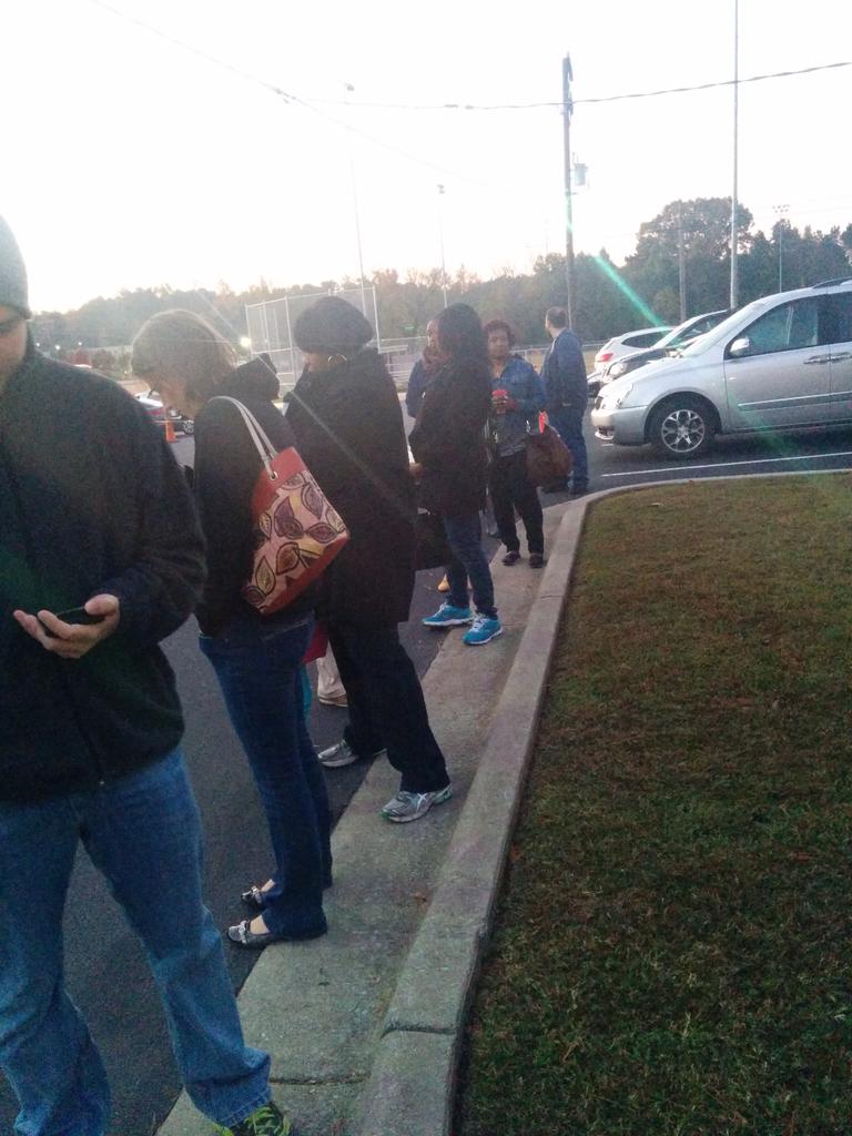 BriceBarnes's tweet photo. Waiting for the polls to open. 30 people deep. #durhamvotes #ncforward http://t.co/25PEXmZ9D6