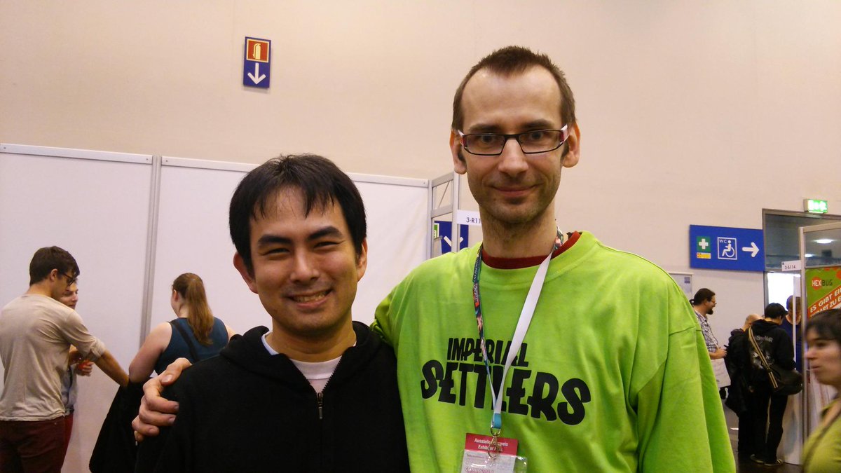 trzewik's tweet photo. Micro game meets macro game, me and Seiji Kanai! Love letter and Robinson :) #Essen2014 http://t.co/yiJd8UpI08