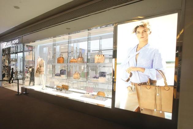 BW's tweet photo. Why Michael Kors can't afford to cut prices: http://t.co/fmBdq4dlQ9 http://t.co/0fdJFP8UUk