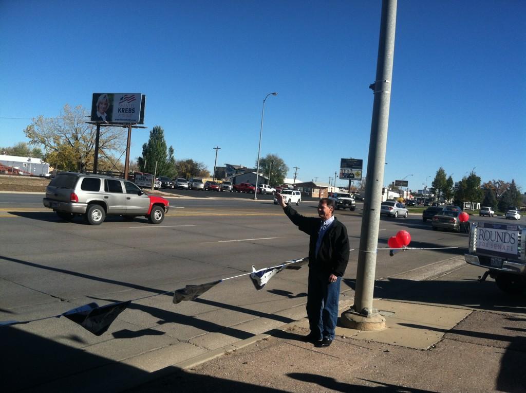 TeamRounds's tweet photo. @RoundsforSenate back in Rapid City waving to cars in the gap... Just like 2002! #sdsen http://t.co/5moBYP7S4l