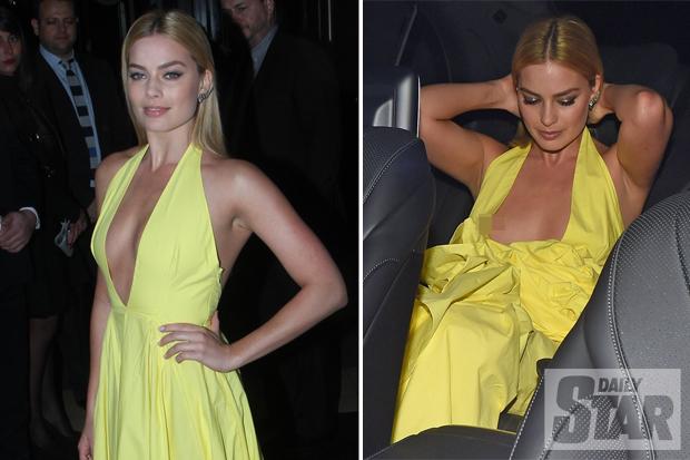 braless backfires MargotRobbie suffers nip slip halter neck gown | Scoopnes...