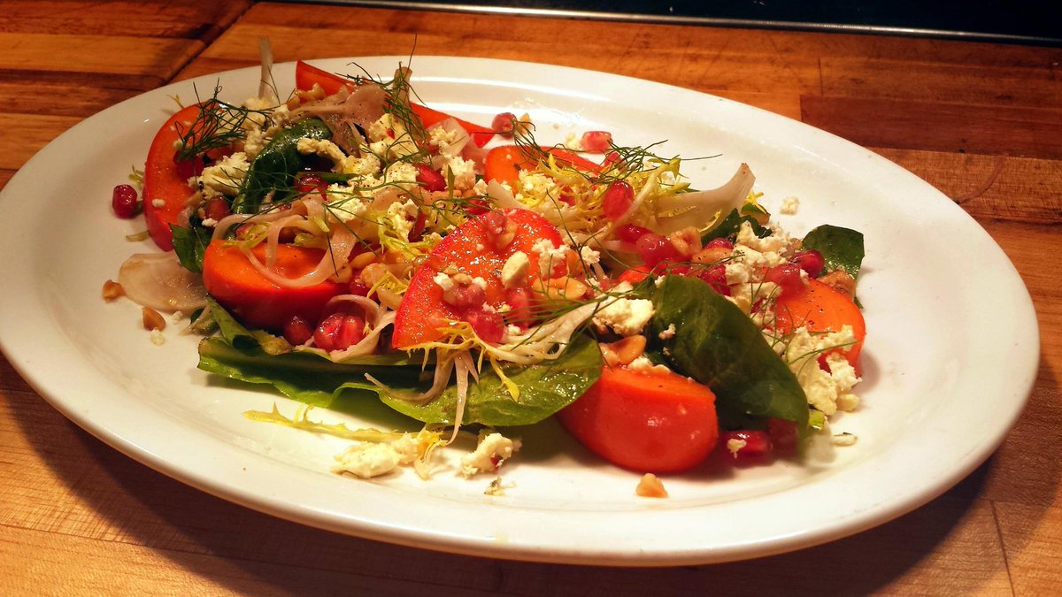 Market Greens, Persimmons, Pomegranate, Mixed Chicory, Feta, Roasted Hazelnuts <a href="/TheWallaceLA/">The Wallace LA</a>.  Seasonal produce.