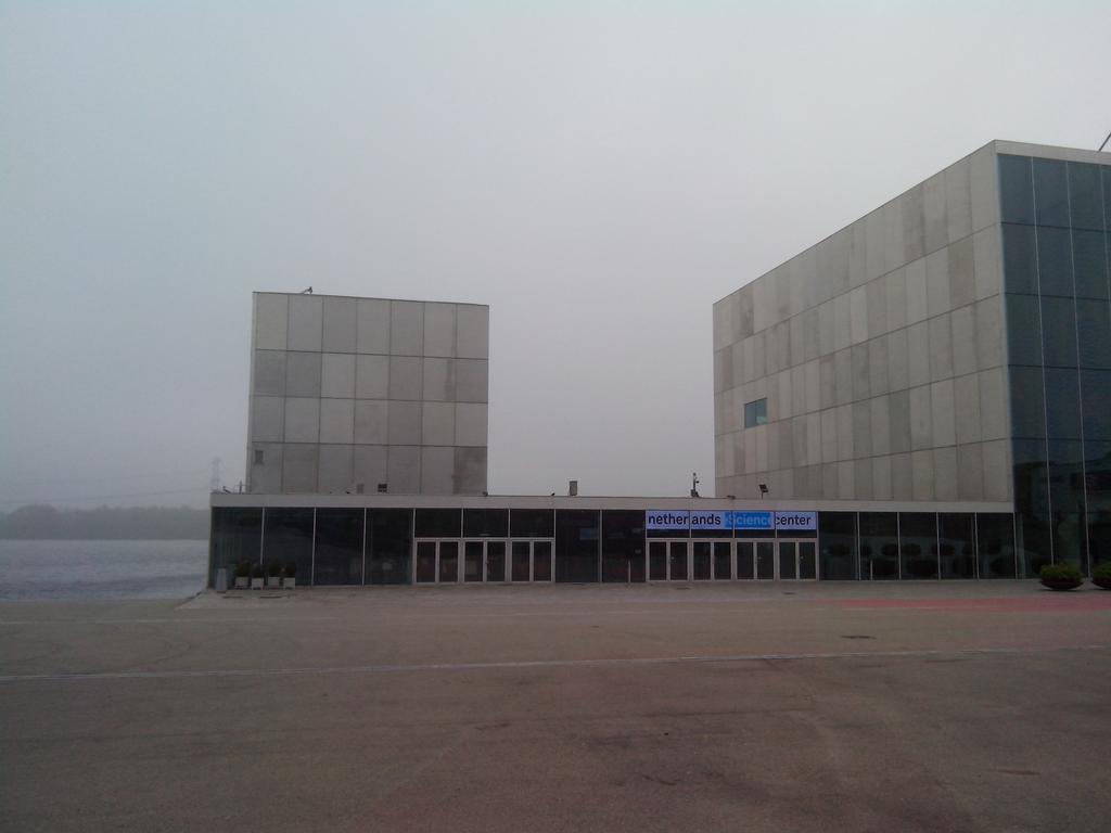 alangedijk's tweet photo. Leuk plekje voor het 2e Nationale #eScience Symposium: Schouwburg #Almere. Ook (juist) mooi in de mist #nlesc14 http://t.co/Kx4hLnyO6f