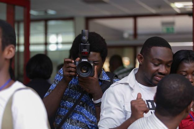 BloggingGhana's tweet image. We know Selfie.What do you call it when a photographer gets photographed like this #BlogCamp14 pic? #BlogCamp15