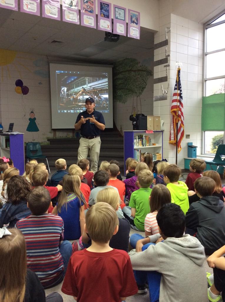 JaredkidBBE's tweet photo. Kennan Simmons talks to students about Mercedes' robots! #engineersrcool #learnup #bbetigers http://t.co/NrJZ4N1bAz