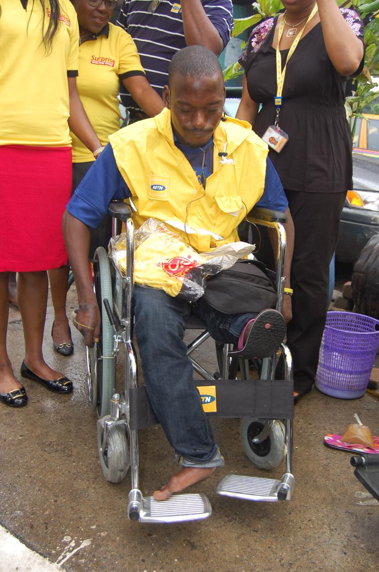 MarketingMixid's tweet photo. Yippee!! Danjuma Adamu an industrious crippled recharge card seller gets a surprise wheelchair from MTN #YelloEleven http://t.co/ZMwzpVTH3o