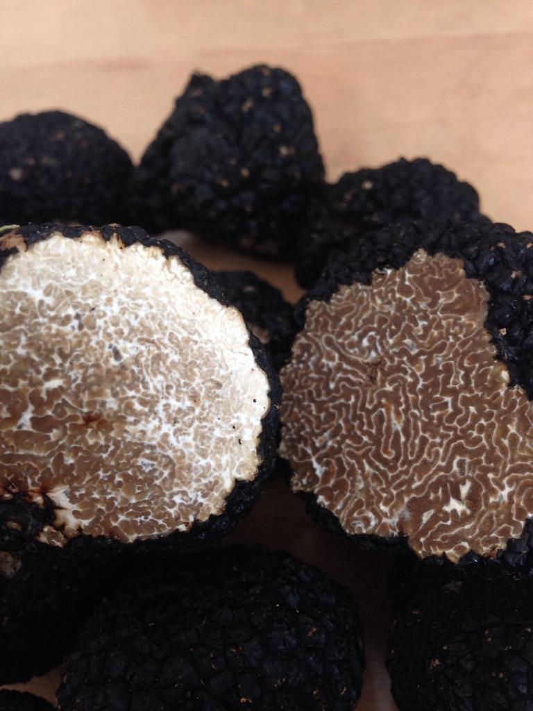 The perfect example of a ripe burgundy truffle, and a not-so-ripe truffle...