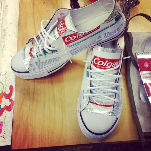 TerraCycle's tweet photo. Tweet below with a "yay" or "nay" if you would wear these shoes made out of #Colgate toothpaste tubes? #upcycling http://t.co/KmjMpNDQP0