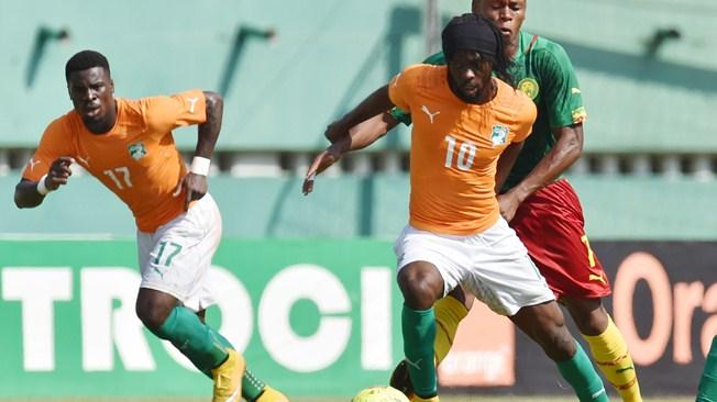 fifacom_fr's tweet photo. La Côte d'Ivoire s'est qualifiée pour la #CAN2015 grâce à son match nul 0-0 face au Cameroun : http://t.co/547ztZDjCj http://t.co/EfK6igJvl0