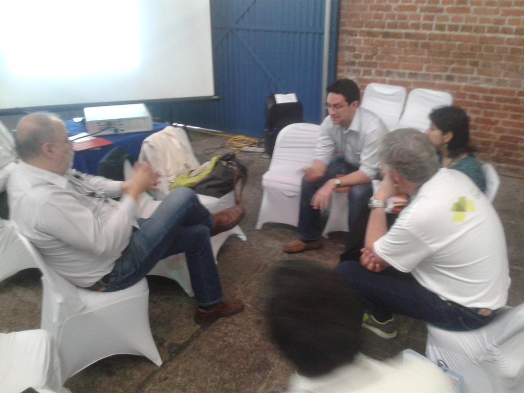 NRGInstitute's tweet photo. In action: NRGI's @cmongesalgado huddles w/ @obtransparencia @CamiloEnciso at @OGPSanJose. Onward, #Mexico #Colombia! http://t.co/IFT2qwU4rj