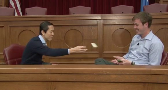 Watch our video at blogs.ou.edu/onebook to see why <a href="/UofOklahomaLaw/">OU College of Law</a>'s Professor Thai was throwing $20 bills at me.