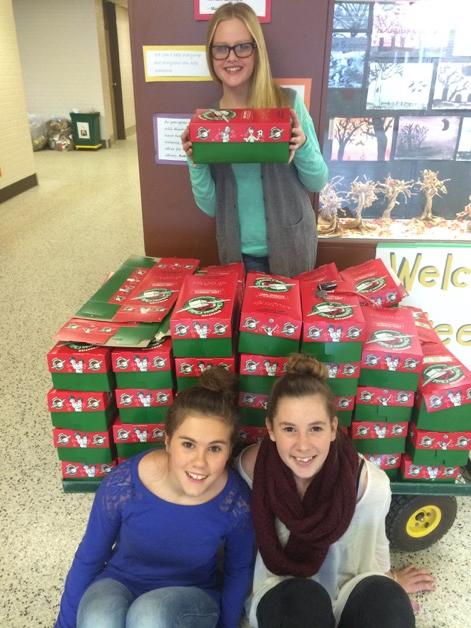 Steele St kids in action Over 50 boxes and $400 for Operation Xmas Child