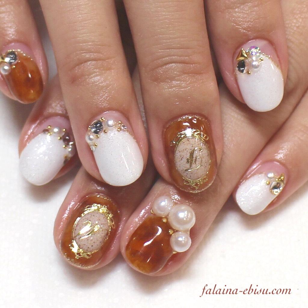 nail_FALAiNA's tweet photo. べっ甲に、人気の立体パール♡ ¥11,556 #ネイル #冬ネイル #nail #falaina #ファレナ #恵比寿 http://t.co/sErJD6U5VV