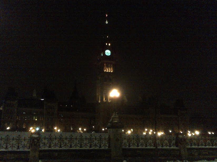 LightUpYellow's tweet photo. Ottawa's Parliament Building and Tomb of the Unknown Soldier in yellow tonight. #LightUpYellow http://t.co/Fbe3QYNKsD