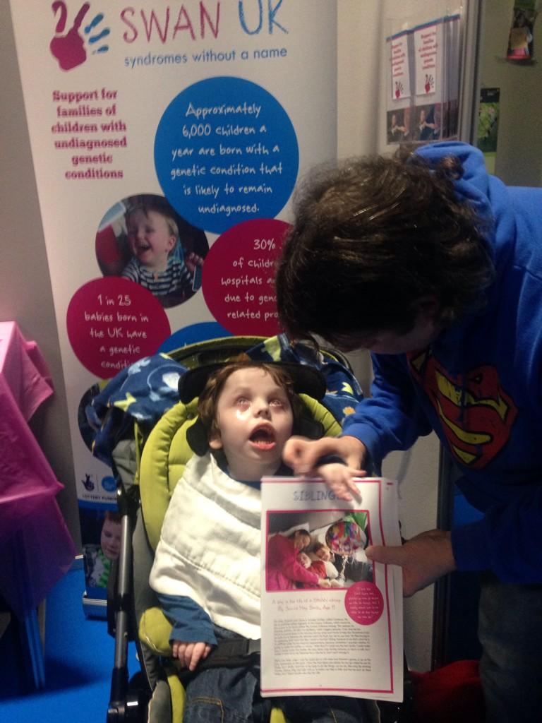 SWAN_UK's tweet photo. One of the stars of our newsletter showing off the newsletter at our stand D28a @Kidz_Events #KidzUpNorth http://t.co/Xefv8sZTkL